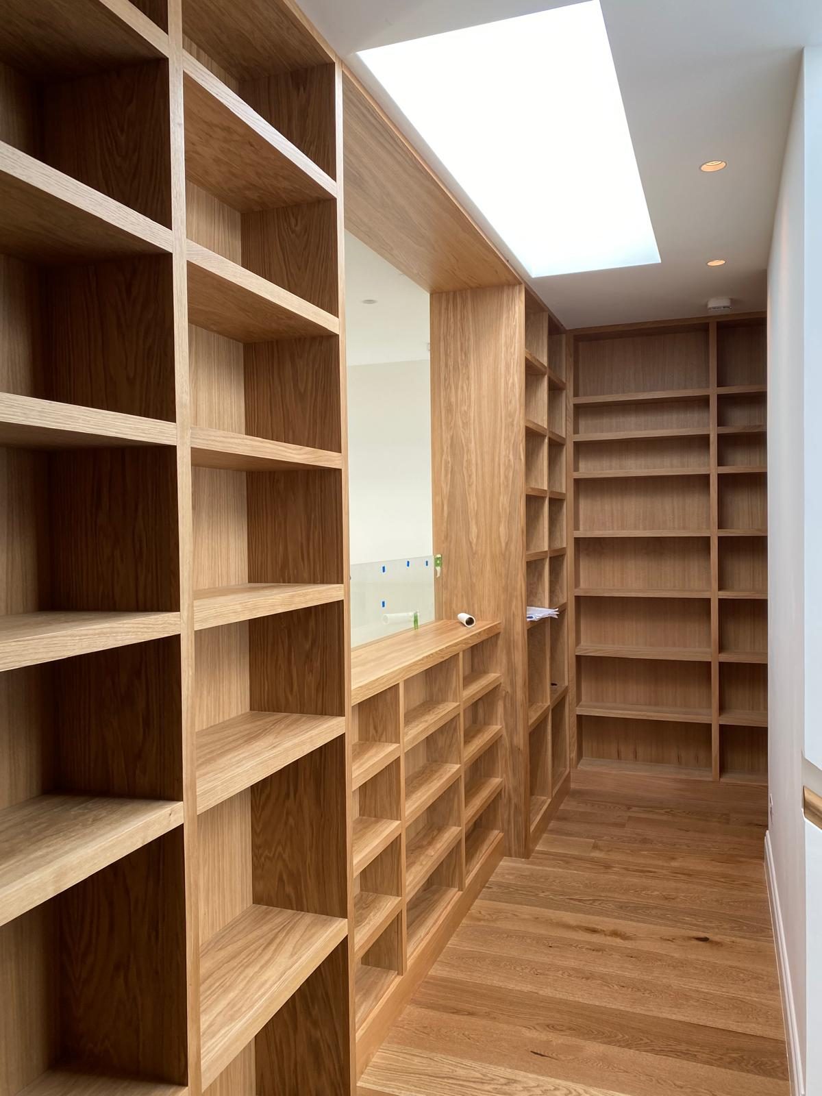 Bespoke oak library and estate joinery, fitted by Aretis Bespoke